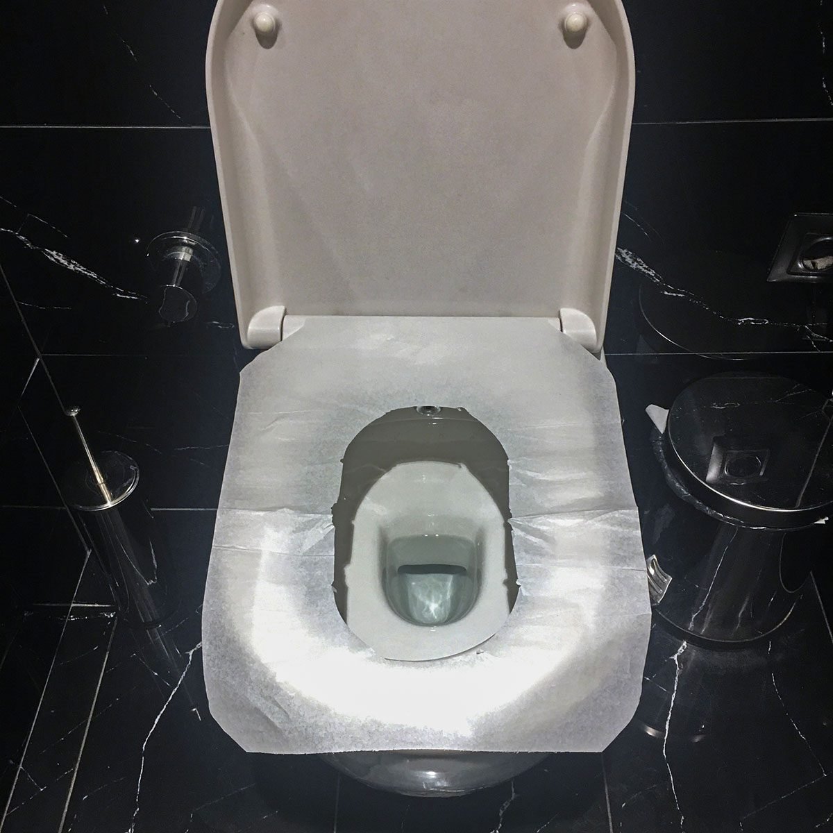 How to use a toilet seat cover (yep, you’re doing it wrong)