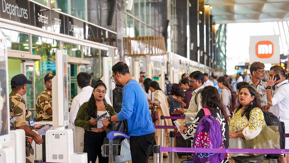 Bengaluru: Passengers in queue at the Kempegowda International Airport, Bengaluru. (PTI Photo/Shailendra Bhojak) (File)