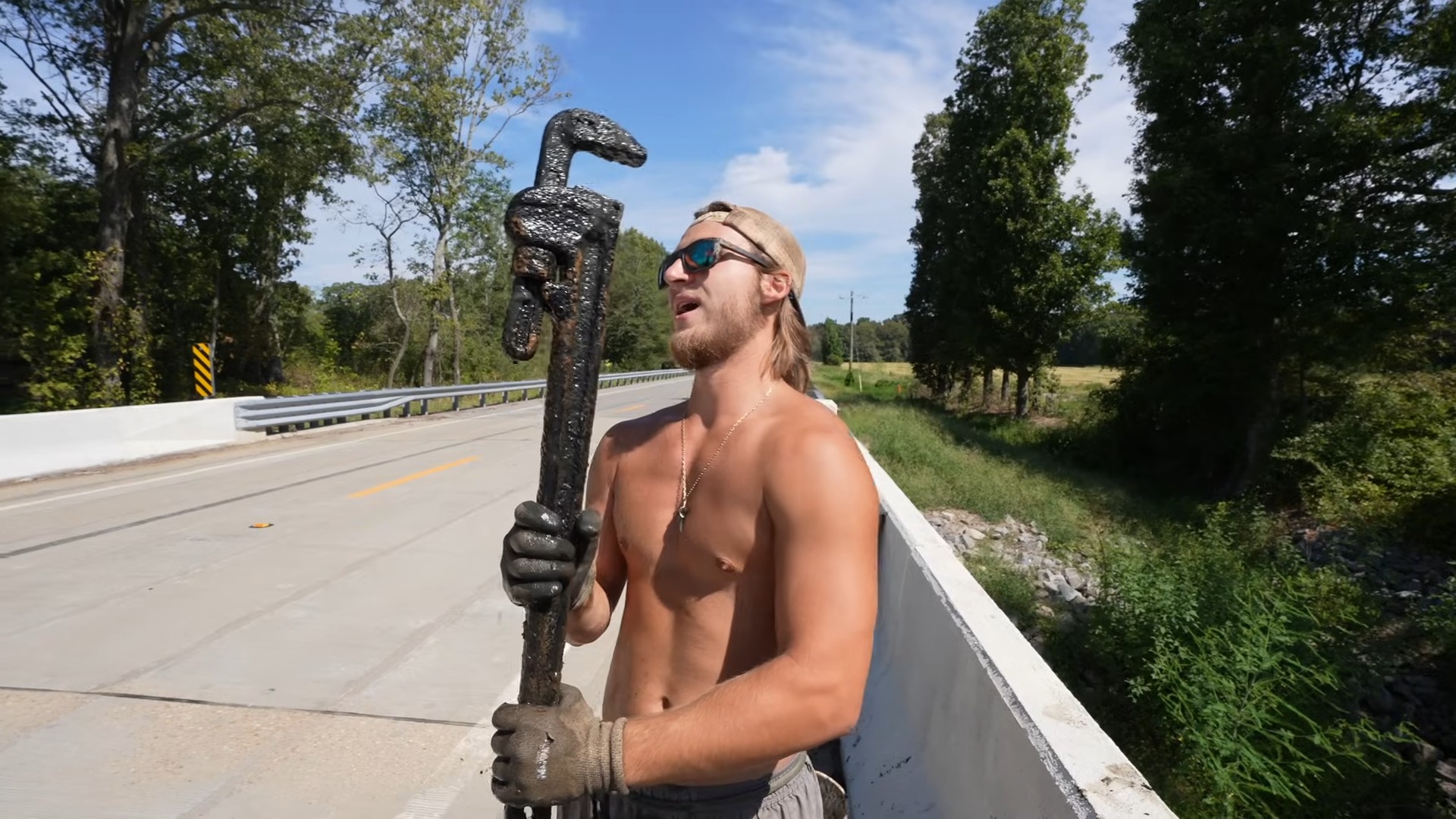 The Rope Snapped Tight… And Something Massive Was Beneath the Spillway