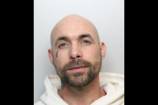 Thug jailed for contacting ex-partner who he set fire to
