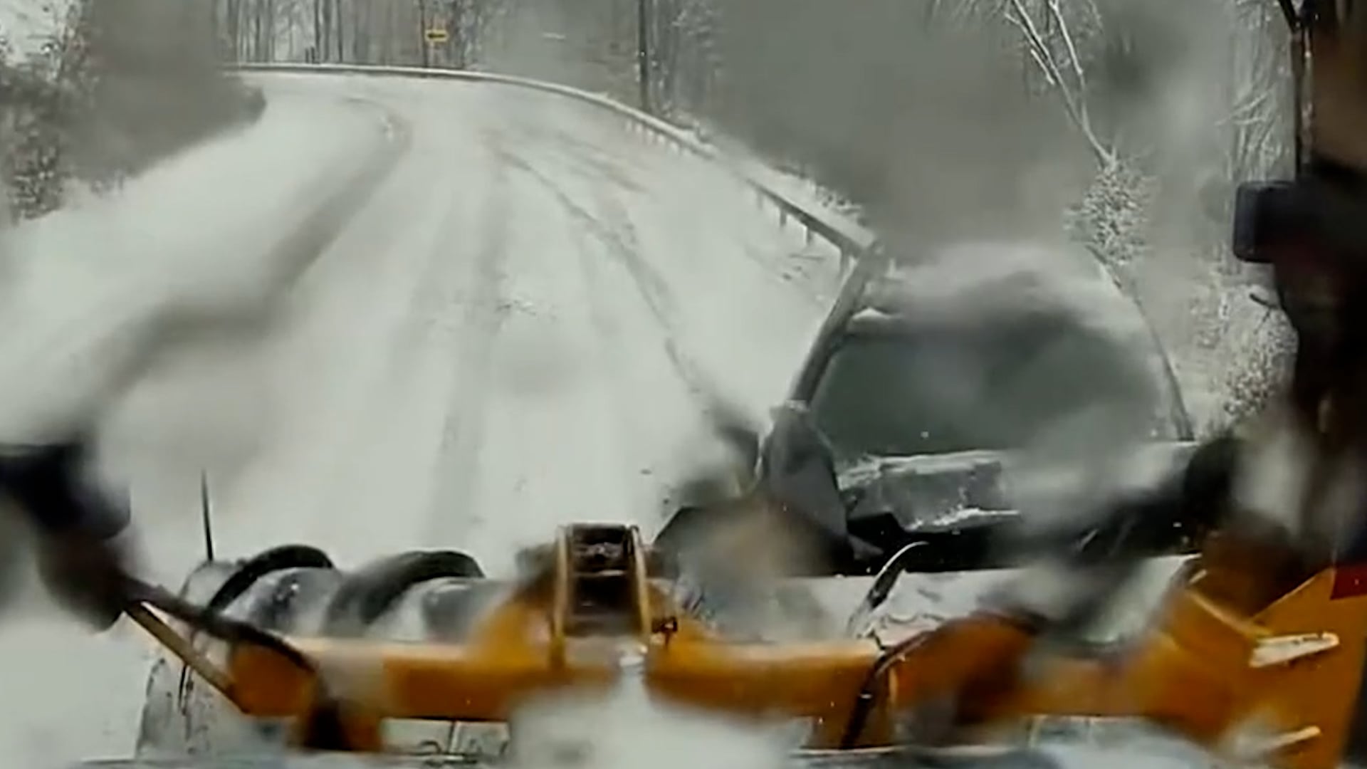 Car crashes into snow plow after losing control on snowy road in New York