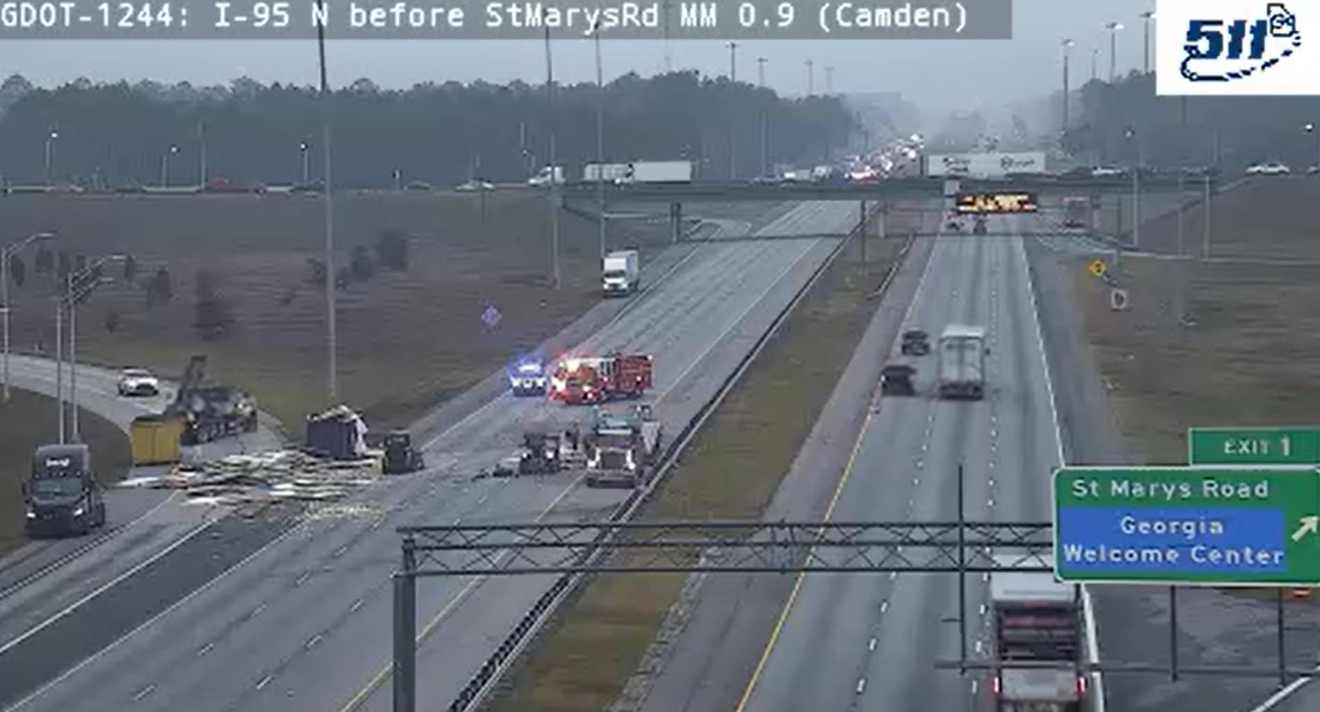 Overturned tractor-trailer shuts down lanes on I-95