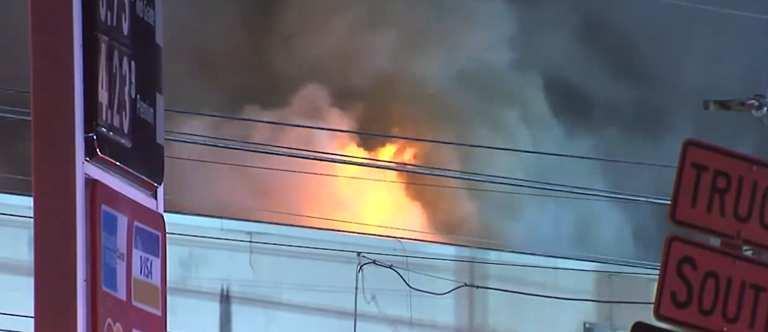 Crews battle blaze at old furniture store