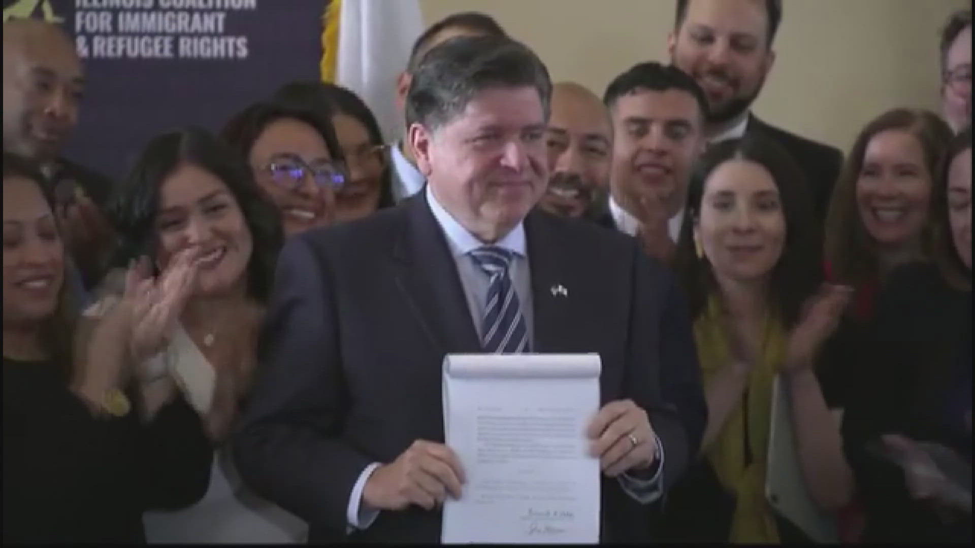 Illinois Gov. Pritzker signs legislation protecting immigrants at ...