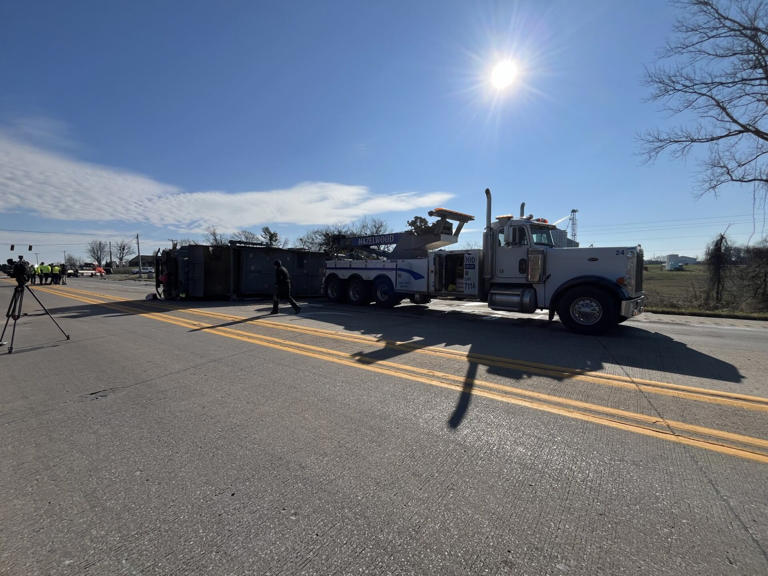 Garbage truck driver flown to hospital after crash