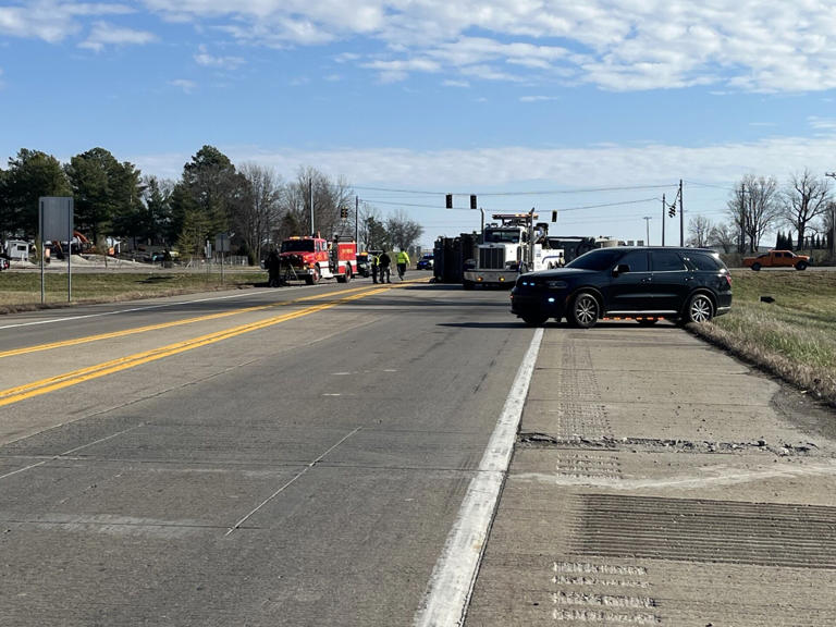 Garbage truck driver flown to hospital after crash