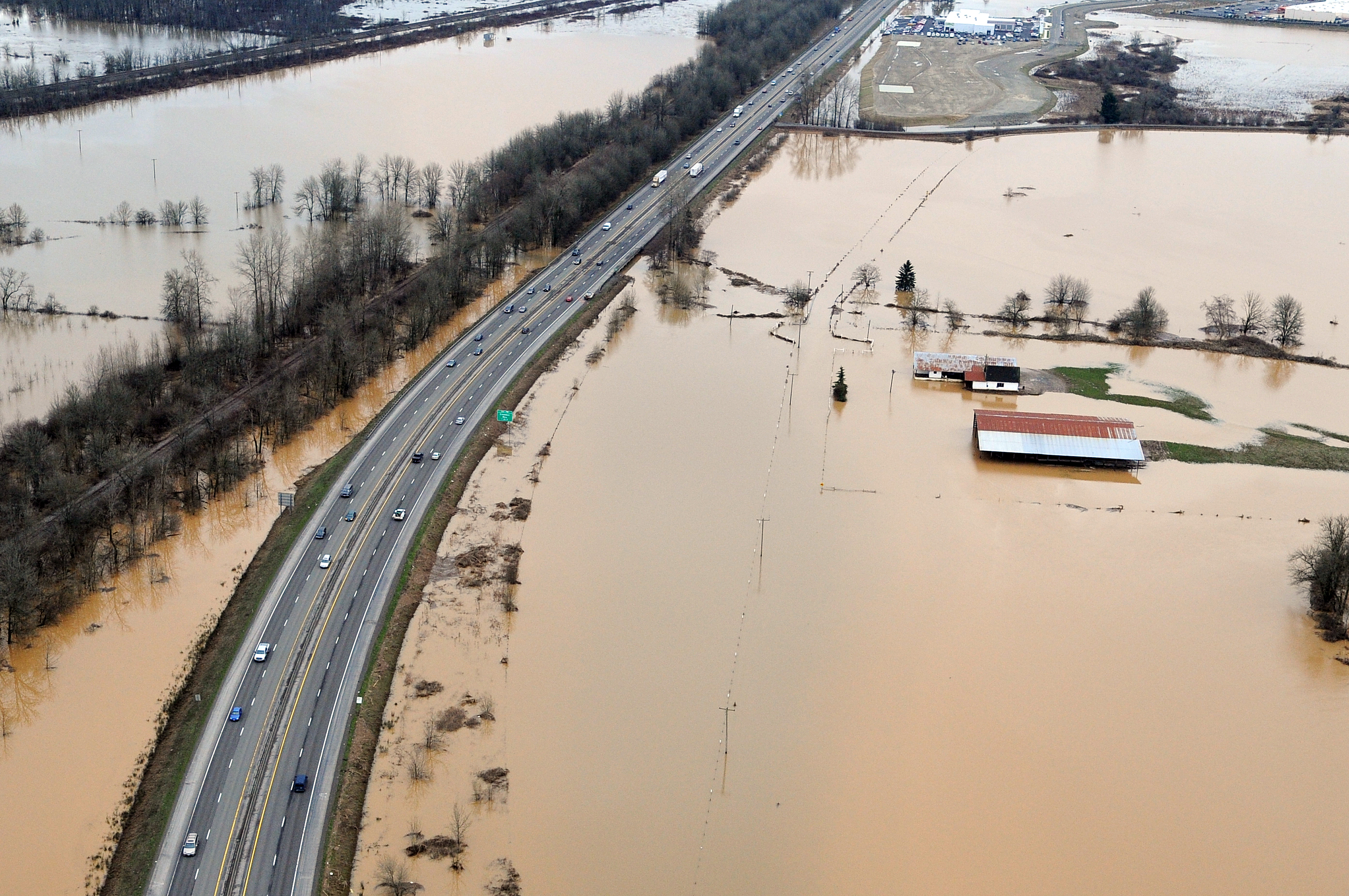 Flood warning issued as excessive rainfall breaks river record