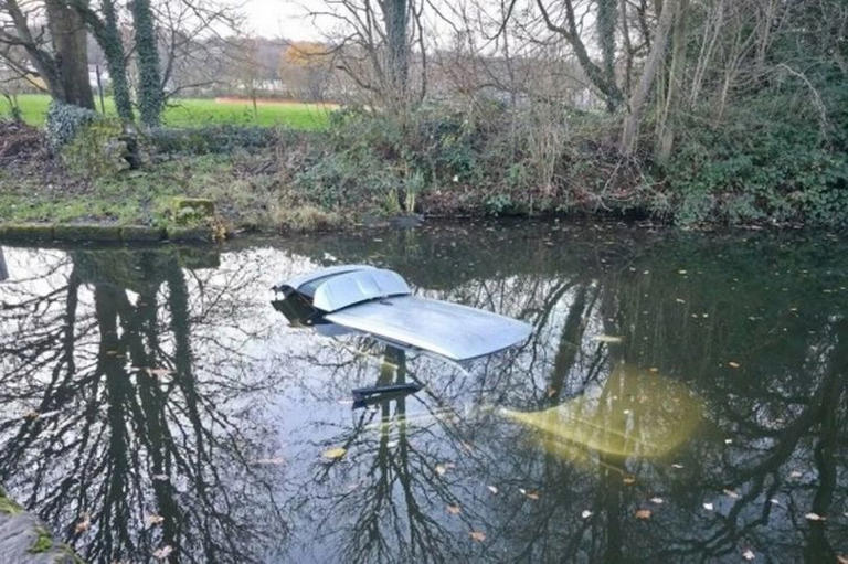 OAP dies after car plunges into canal despite police desperately trying ...
