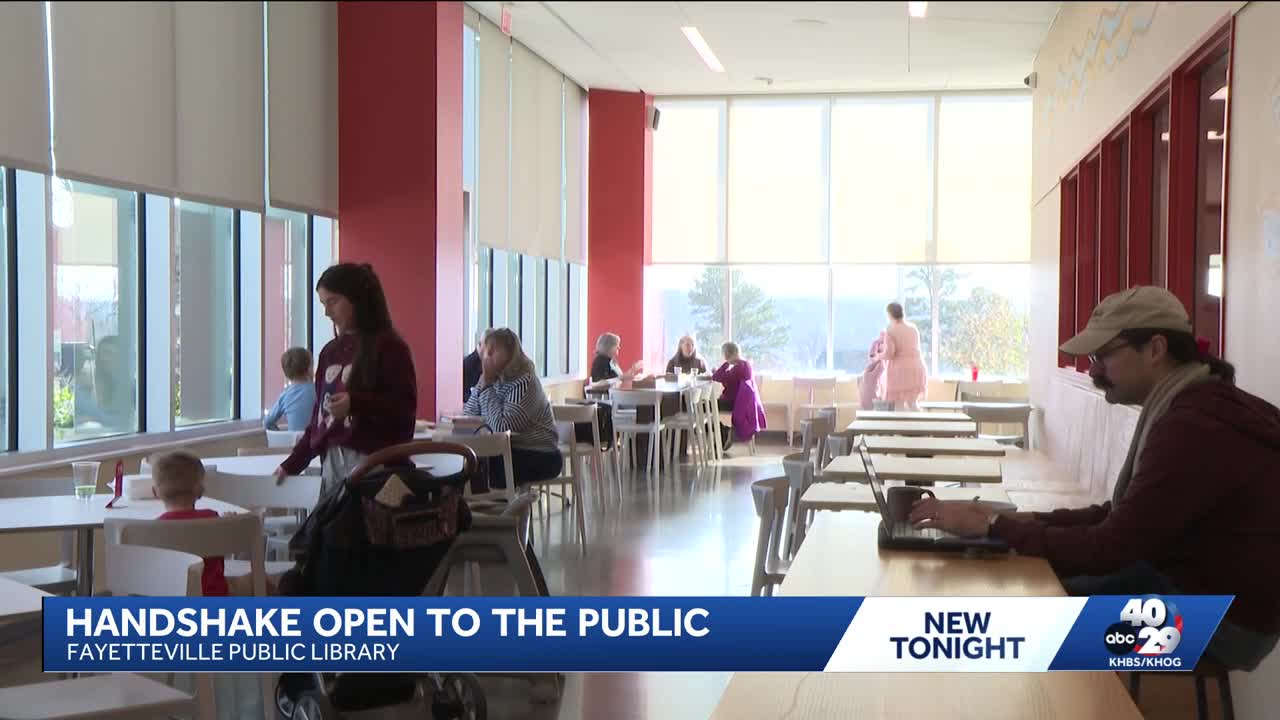 Handshake opens doors to public at the Fayetteville Public Library