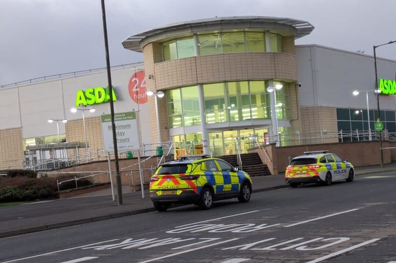 Edinburgh police swoop on Asda supermarket as front of store taped off