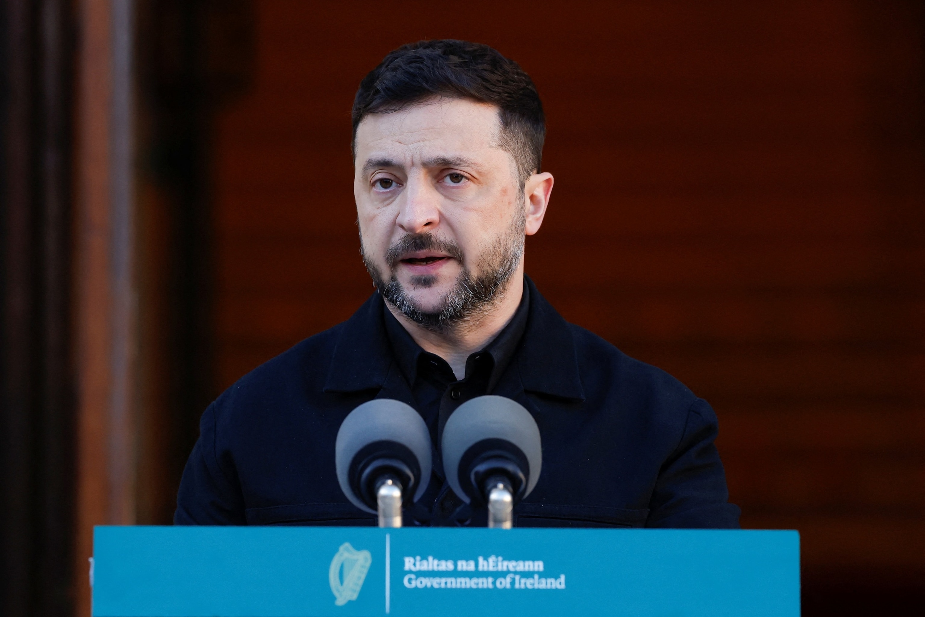 Clodagh Kilcoyne/Reuters - PHOTO: Ukrainian President Volodymyr Zelenskyy speaks after a meeting with Ireland's Taoiseach Micheal Martin at a government building, December 2, 2025, in Dublin, Ireland.