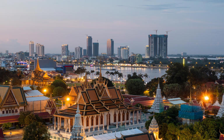 Phnom Penh wakes up for another night of eating and drinking, with new hotels rising in the skyline - Craig Hastings