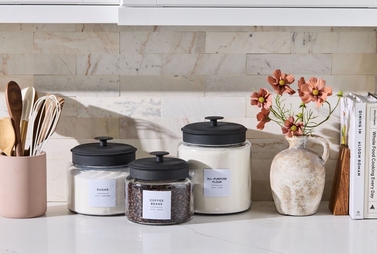 Multiple kitchen canisters on countertop