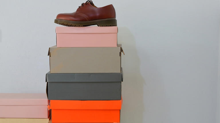 Don't throw away old shoe boxes, use them as unique wall decor