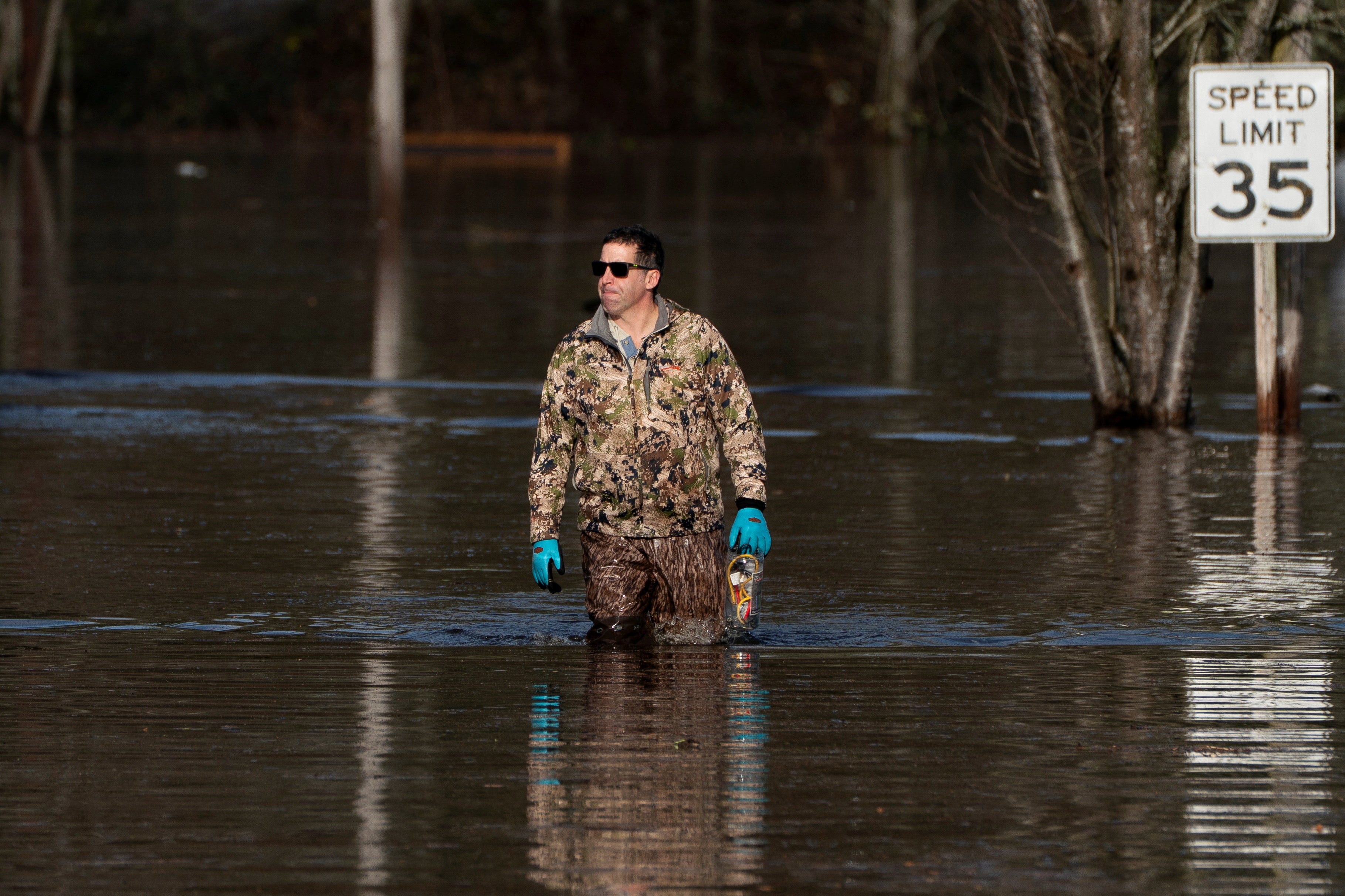 Photos show atmospheric river bringing flooding to Pacific Northwest