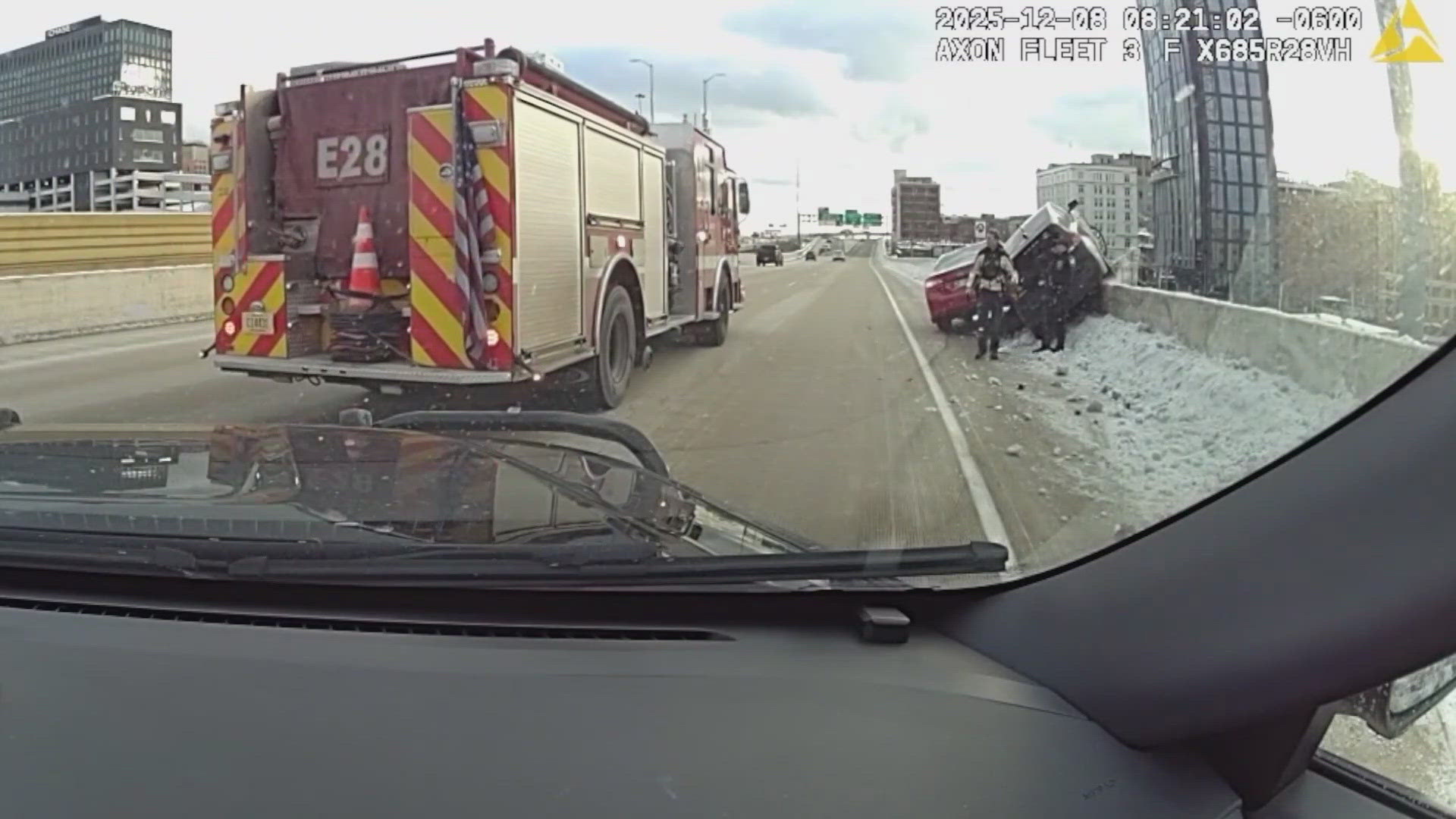 Bodycam video shows dramatic rescue after crash sent FBI agent's SUV ...