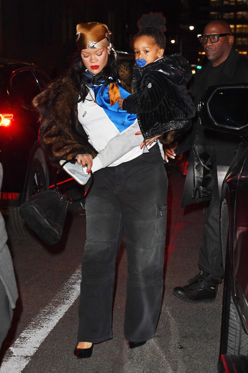 Rihanna wears a pom pom zip-up to Jay-Z’s Roc Nation party with Beyoncé ...