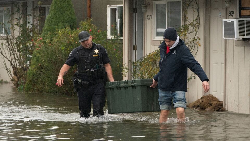 US weather: Rivers swell, residents warned of record flooding as heavy ...