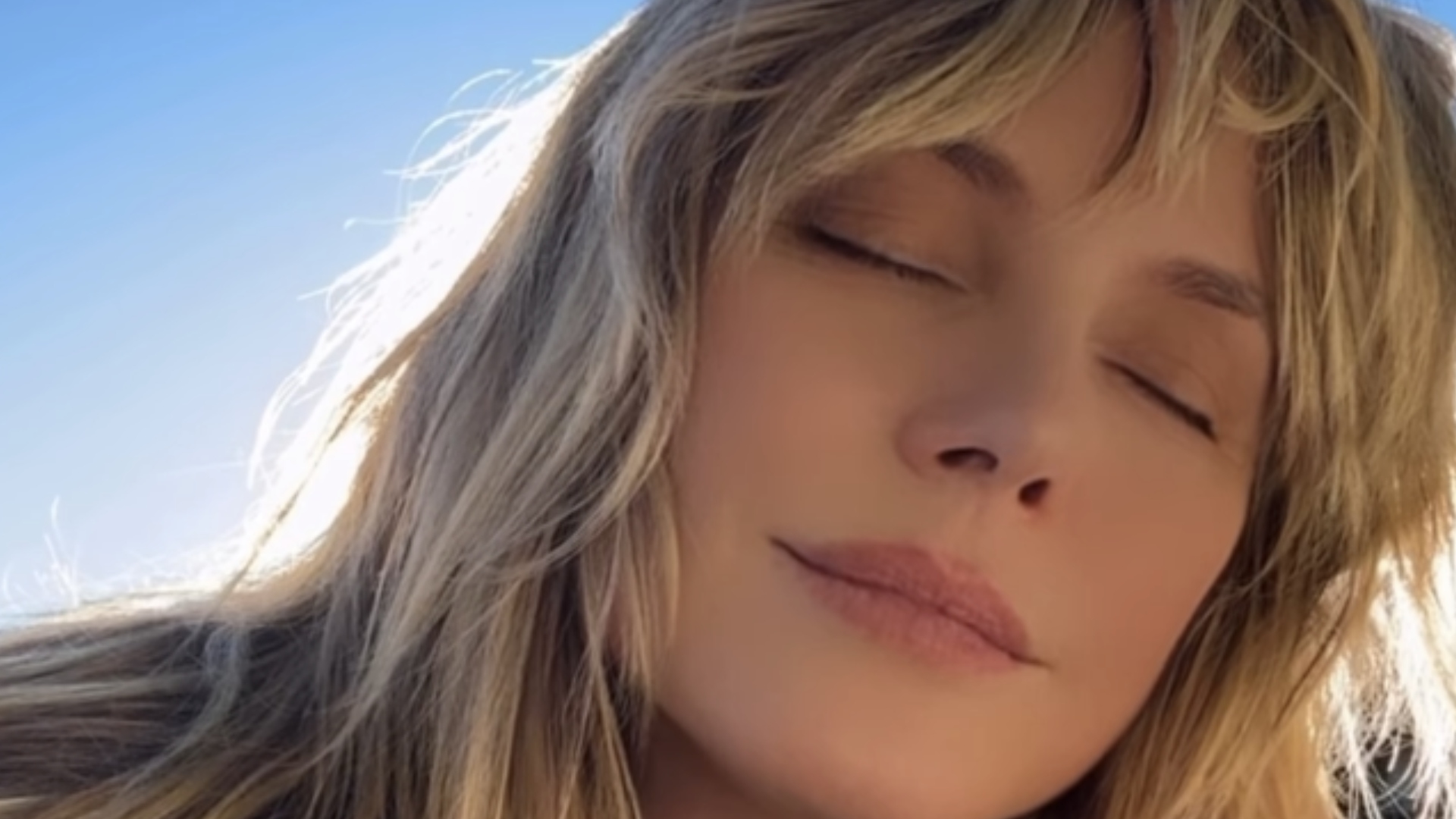 At 52, Heidi Klum is tanning and showing off her figure on the beach