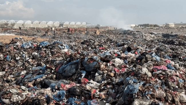 Trash piles up in Khan Yunis, posing 'critical' risks to public health