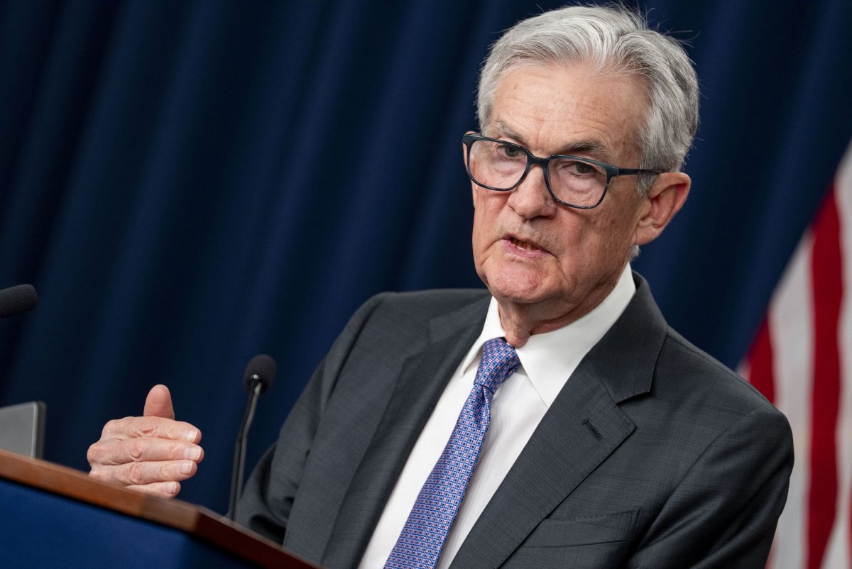 Divided US Federal Reserve cuts interest rates in narrow 9-3 vote