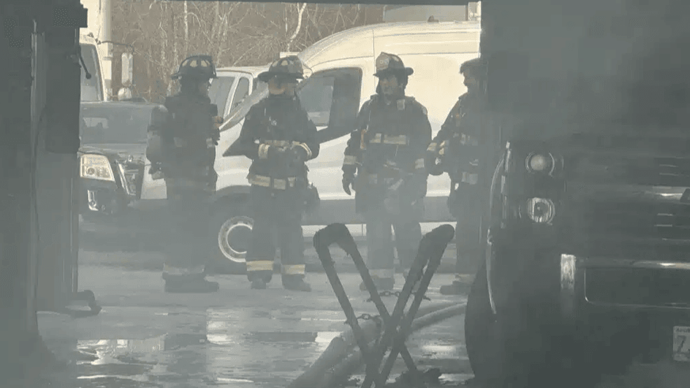 Firefighters battle fire at car dealership in Taunton