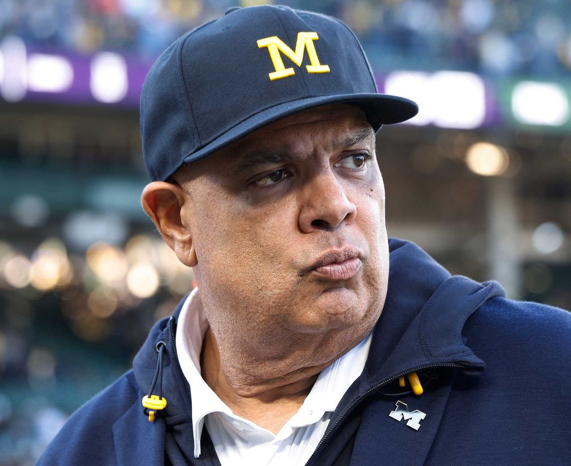 Michigan football head coach detained by police after he's fired over ...