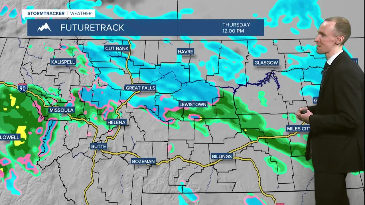 Falling temperatures and rain showers switching to snow showers on Thursday