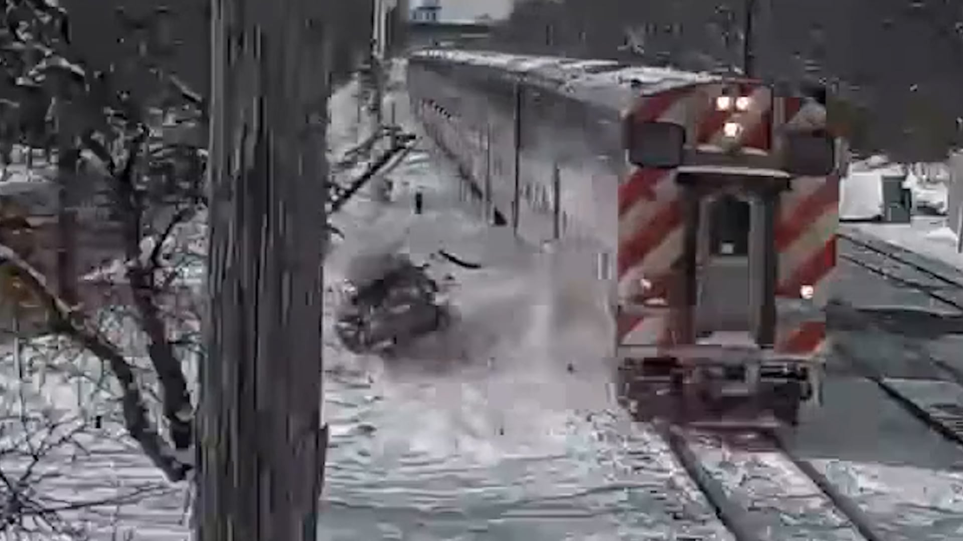 Train crashes into car at crossing in Illinois