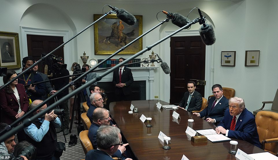 Trump rages 'corrupt' CNN must be sold in fiery clash with reporter