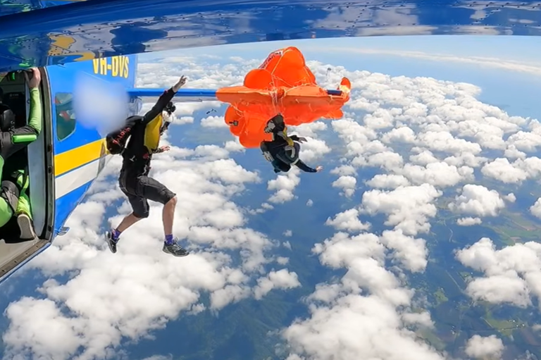 Skydiver survives after parachute gets caught on plane’s wing