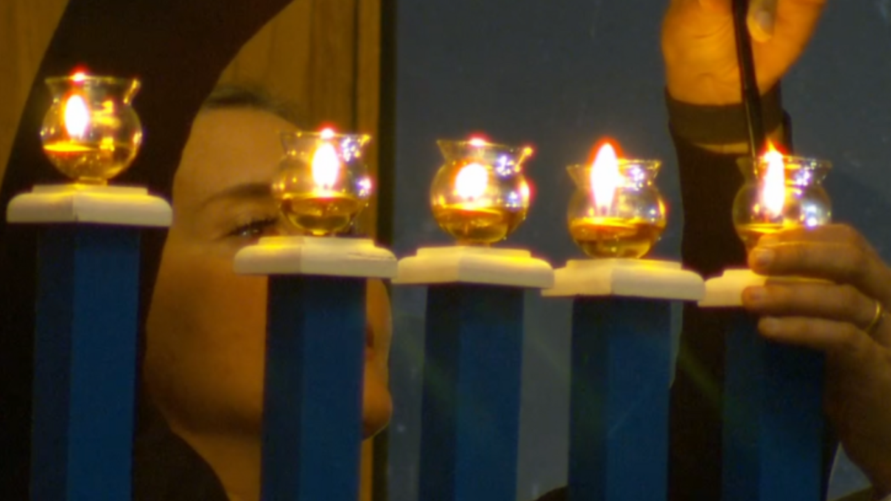 In shadow of tragedy, SLC Jewish community gathers to light Hanukkah ...