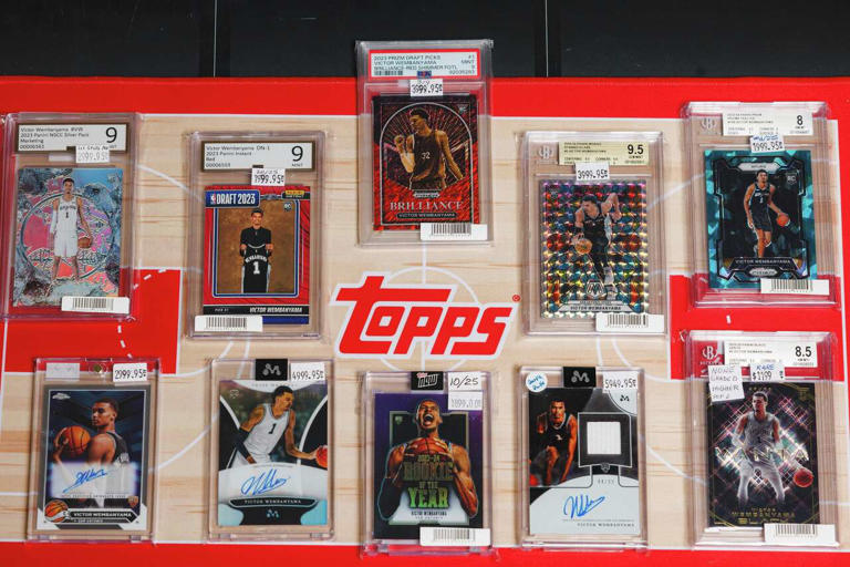 Wembymania card mania is real. Sports Cards Plus offers customers several rare and hard-to-find trading cards of Spurs star Victor Wembanyama, some selling for several thousand dollars each. (Sam Owens/San Antonio Express-News)