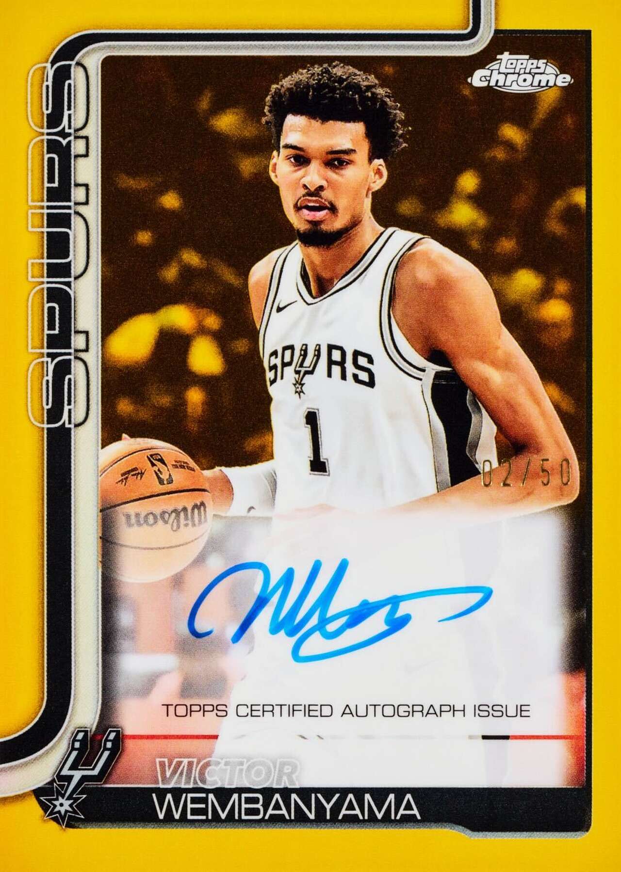 The new Topps Chrome Basketball set includes 19 different card designs of Spurs star Victor Wembanyama. Pictured is an autographed Gold Refractor card, one of only 50 in the set. (Courtesy Topps)