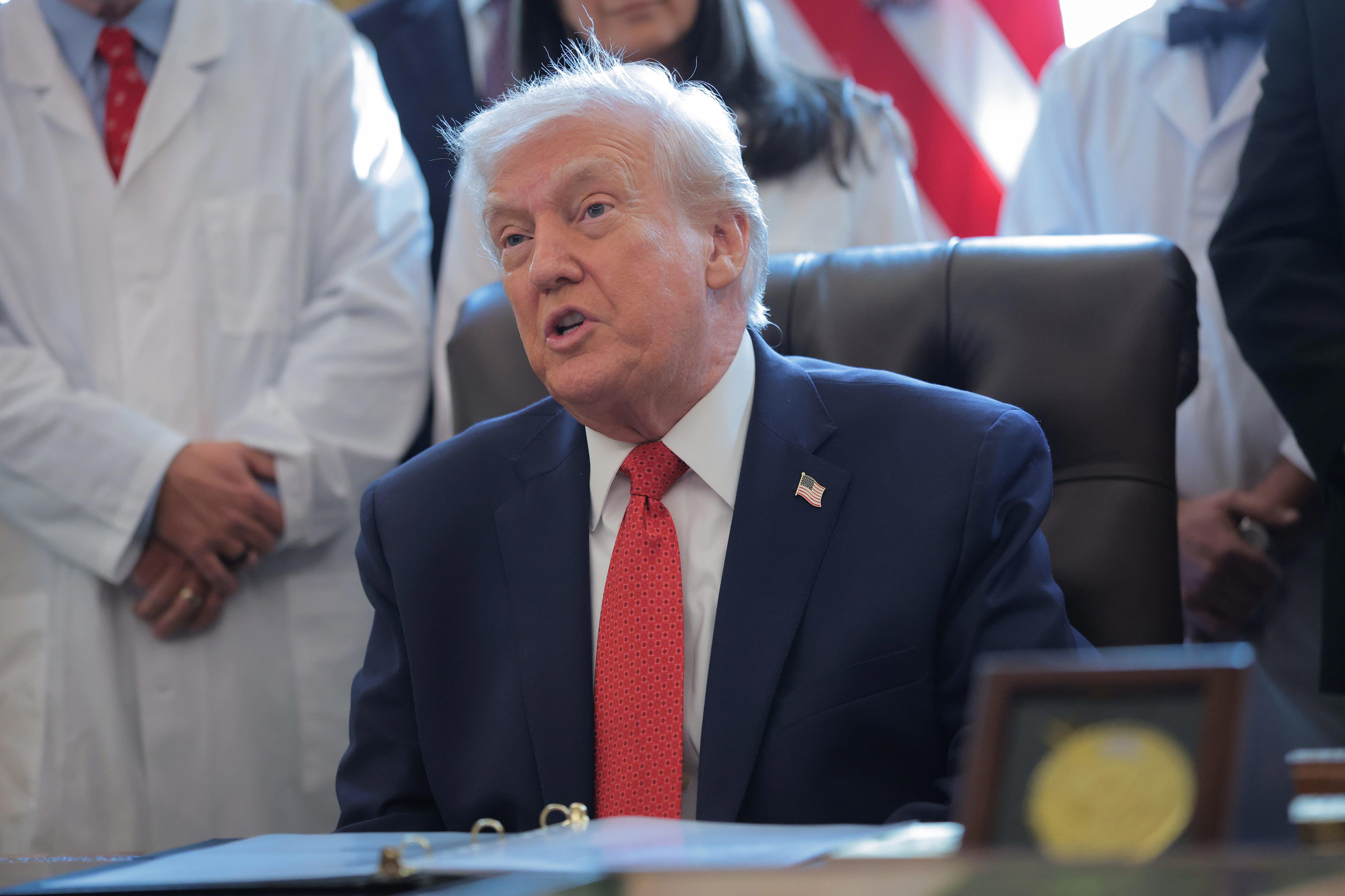 Trump orders less dangerous federal classification for marijuana