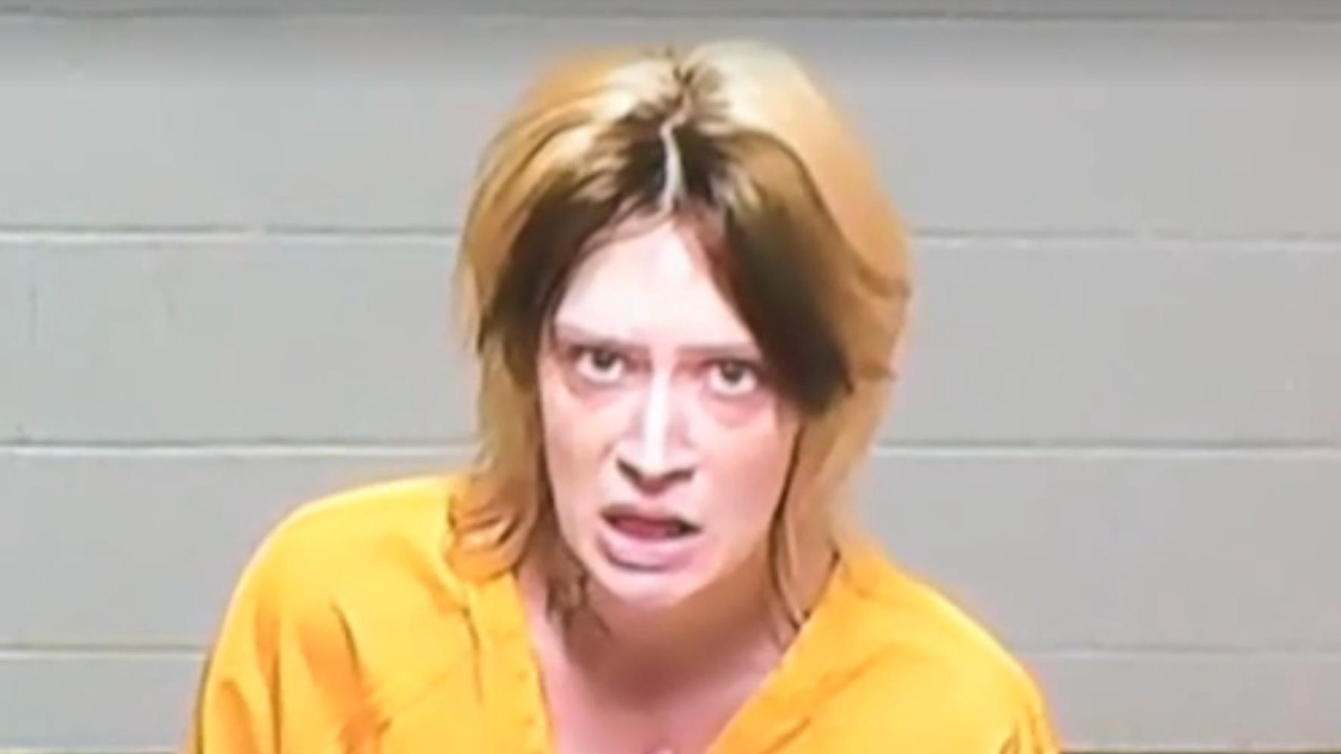 Kansas mom accused of son's murder gasps for air during court appearance