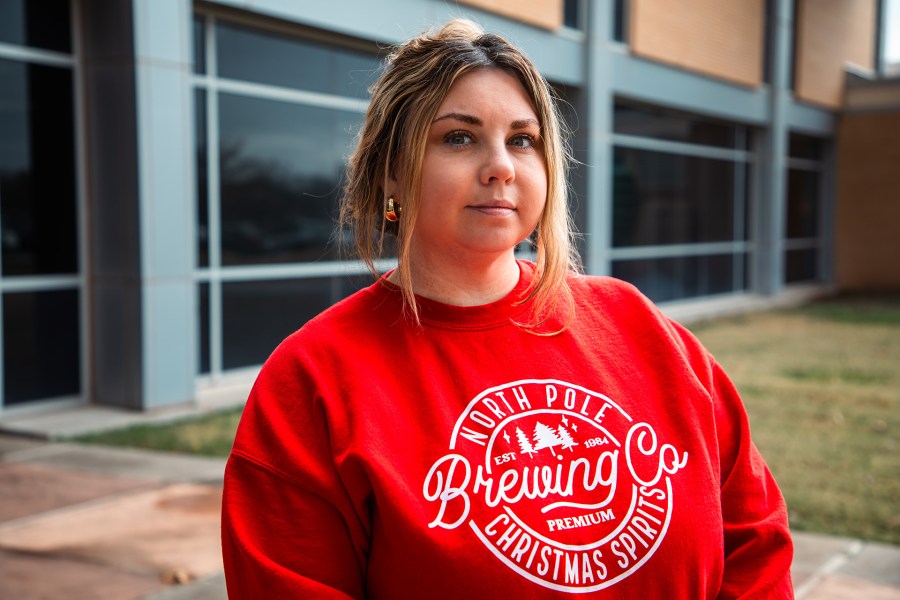 A single mother, once a high school dropout, becomes an AC graduate
