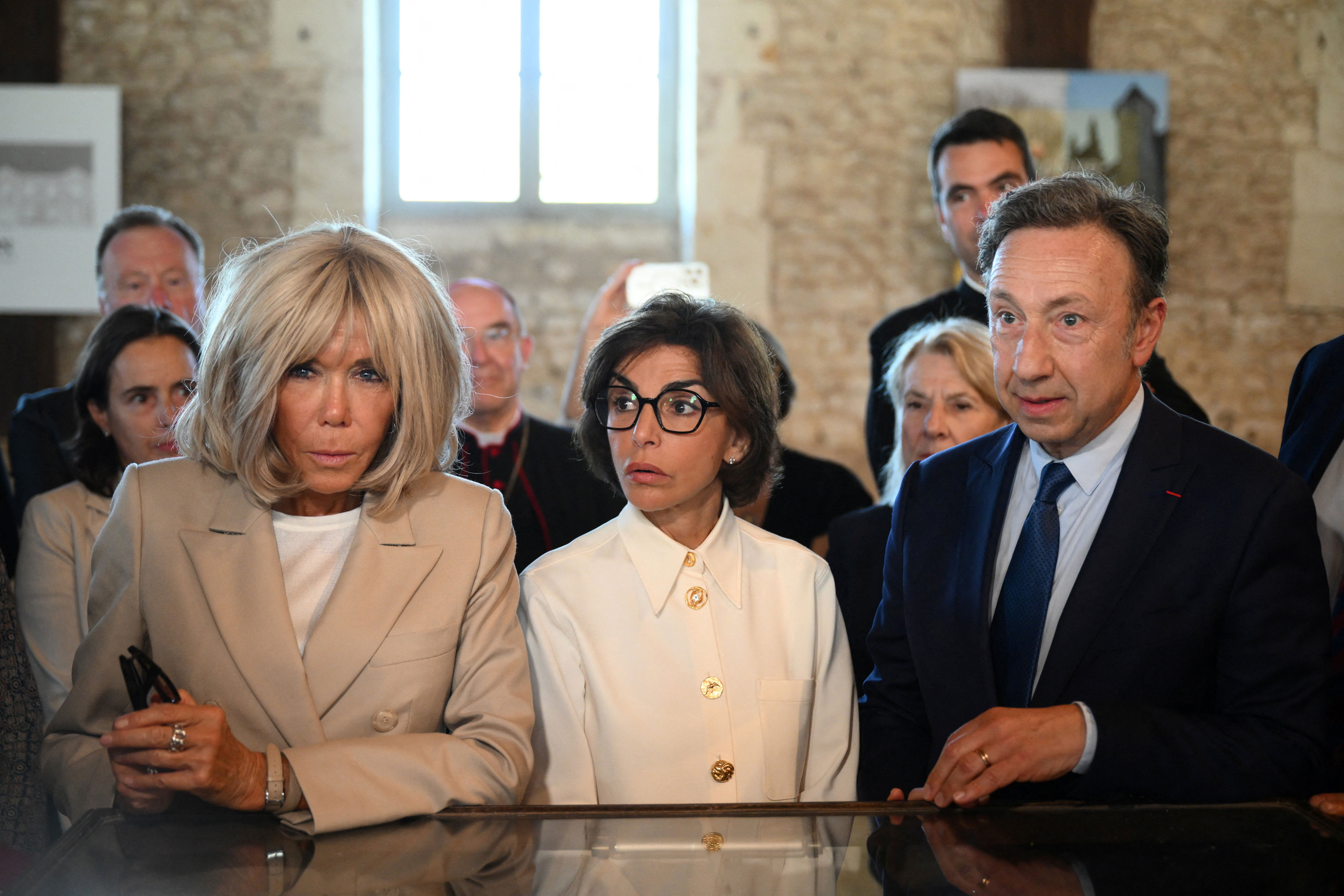 French President Emmanuel Macron's wife, Brigitte Macron, French Minister of Culture Rachida Dati and French journalist Stephane Bern (Reuters)