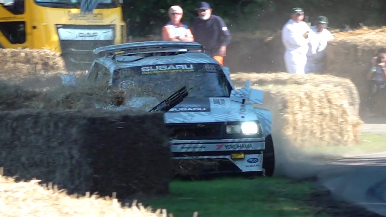 This Subaru rally car barely misses the hay bales