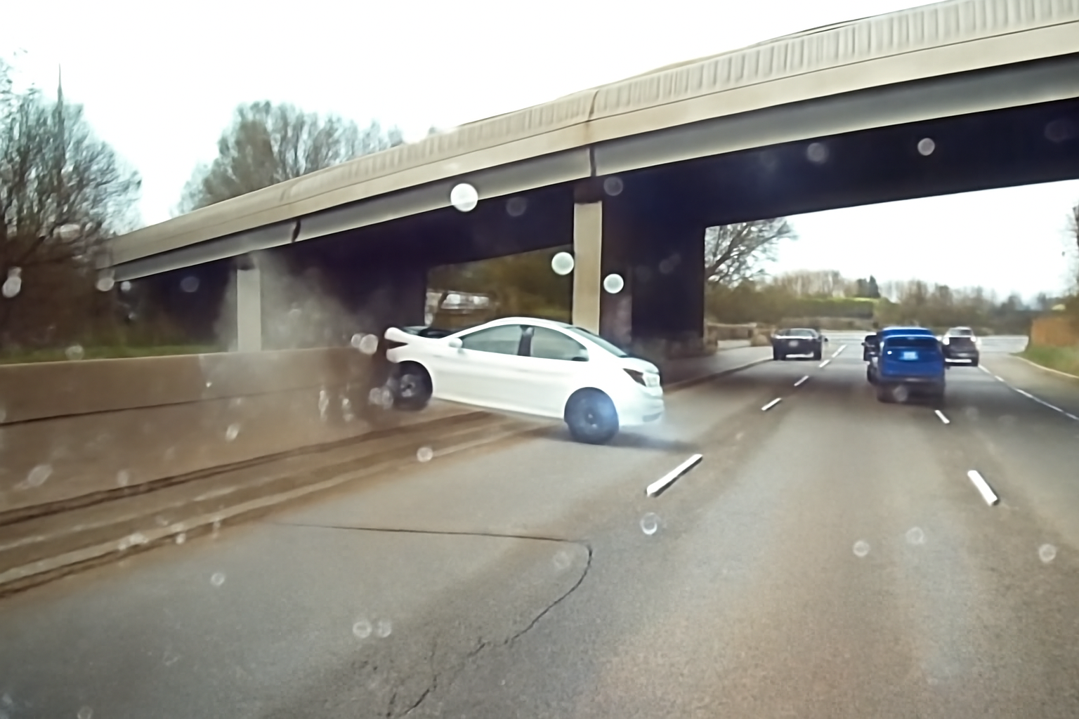 Driver loses control and hits the barrier