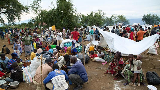 Internally displaced people (IDPs) fleeing fighting in Congo's South Kivu province arrive in Cibitoke, Kansega, Burundi, Thursday, Dec. 11, 2025.