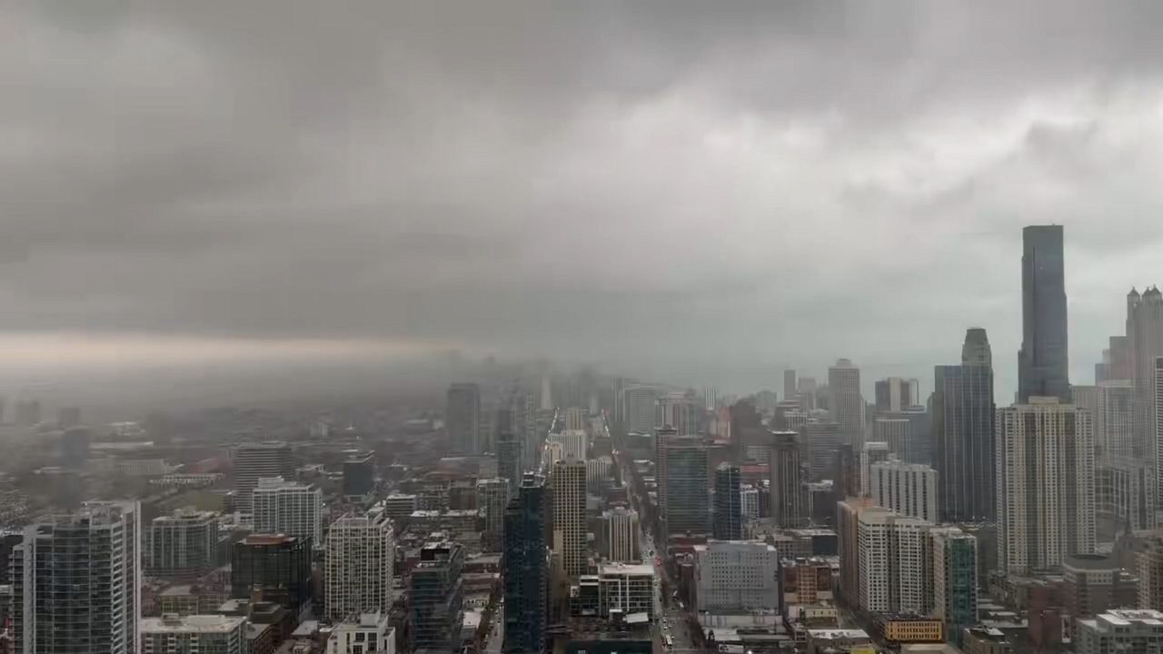 Dark storm clouds sweep across the Chicago skyline
