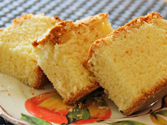 close up view of sliced Kentucky Blue Ribbon All-Butter Pound Cake on a colorful plate