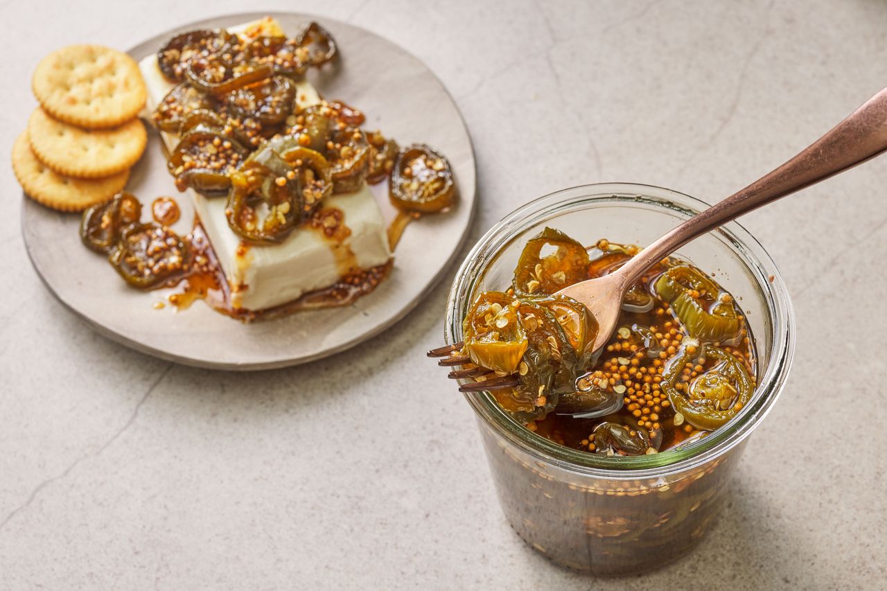 Southern Living Cowboy Candy in a jar and on top of cream cheese with crackers to serve