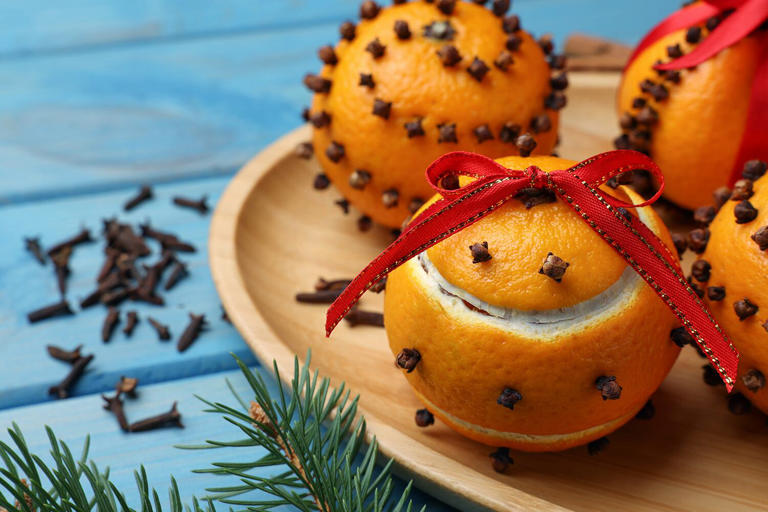 Orange pomander studded with cloves. /Getty Images Bank