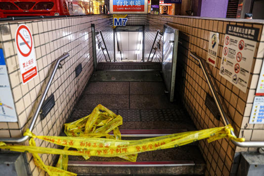 This picture, taken and released by Taiwan’s Central News Agency (CNA) on 19 December 2025 shows one of the entrances to Taipei Main Station being cordoned off (Central News Agency (CNA)/AFP)