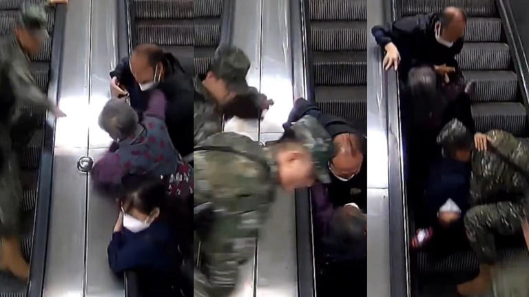China: Alert Cops Climb Guardrail To Rescue Elderly After Slipping ...