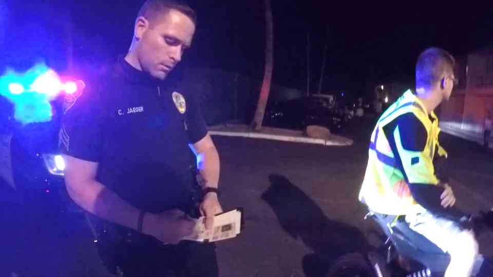 Biker challenges cop in tense confrontation