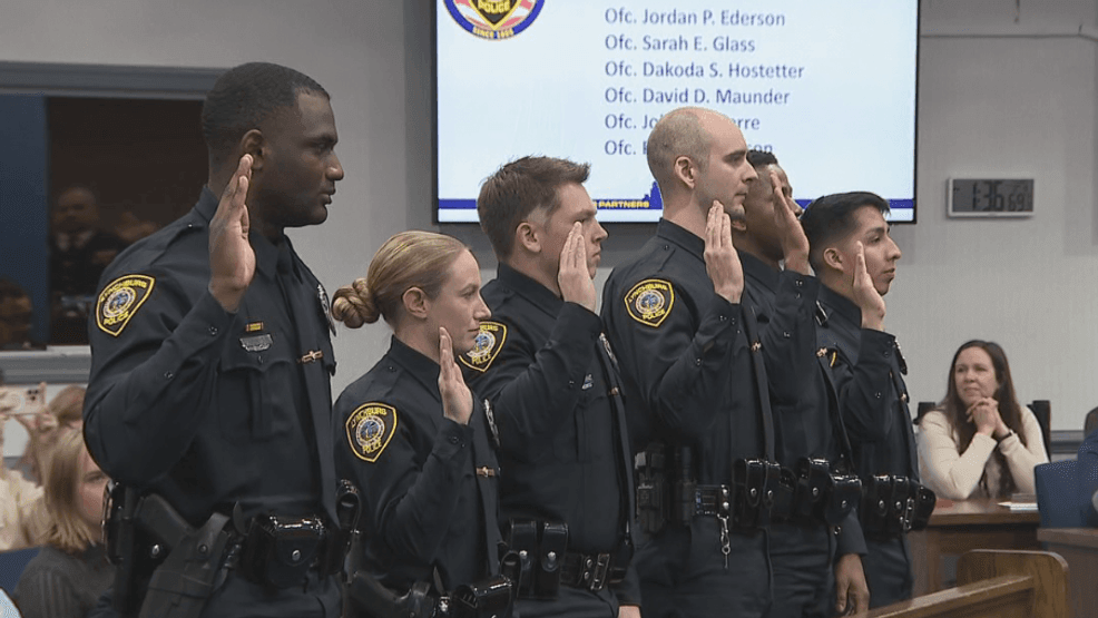 Family and city leaders celebrate as six new officers take oath to ...
