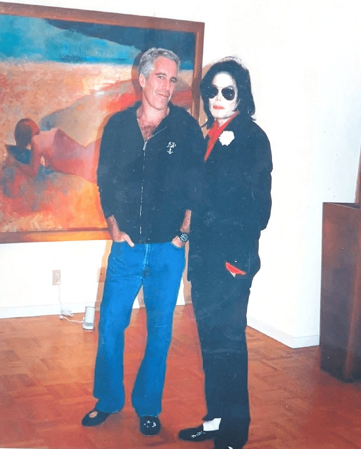 Jeffrey Epstein poses with Michael Jackson in this image released by the Department of Justice in Washington, D.C., U.S., on December 19, 2025 as part of a new trove of documents from its investigations into the late financier and convicted sex offender Jeffrey Epstein. Images were release without locations, dates or context.